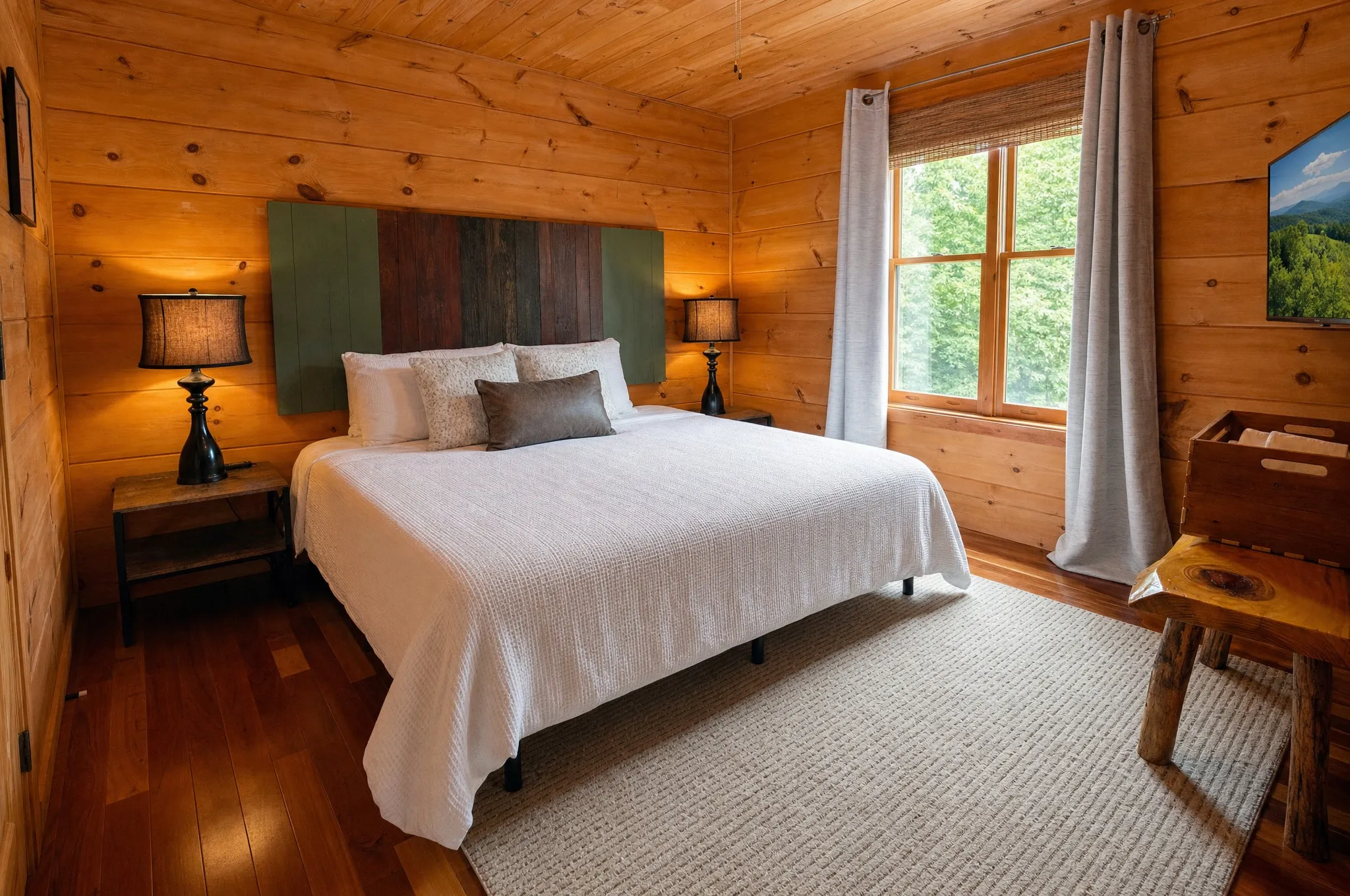 Main-level king bedroom with window seating