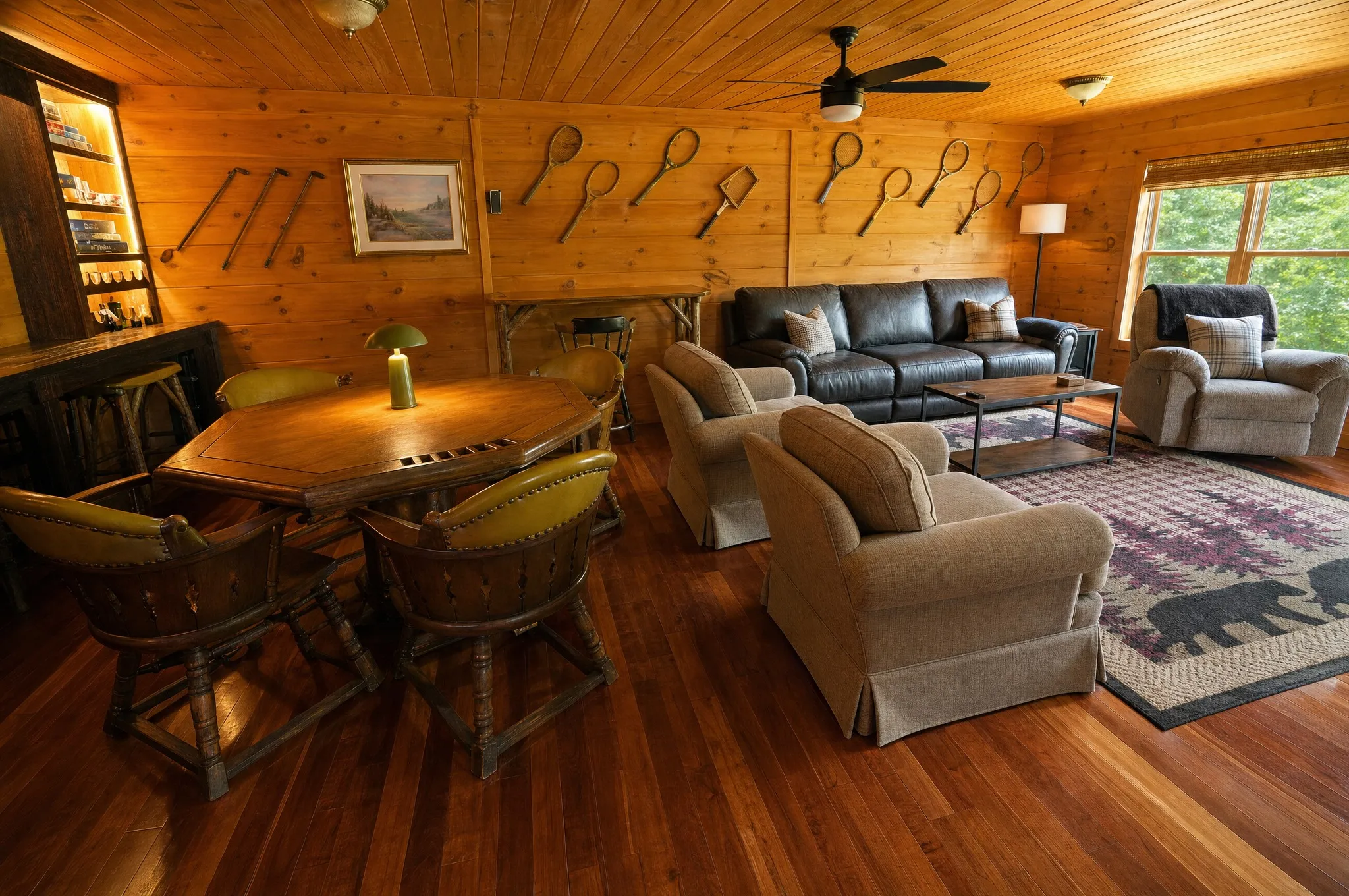 Remodeled rec room with a card table and lounge seating